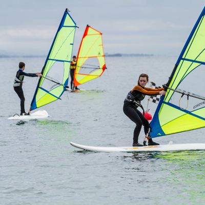 three young people learning to windsurf dingle peninsula