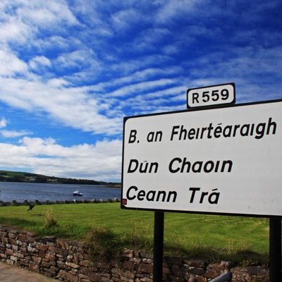 Irish language roadsign for Ballyferriter, Dunquin and Ventry Dingle Peninsula Ireland