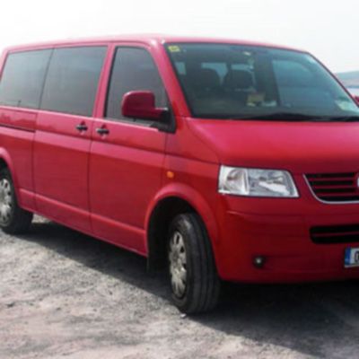 red taxi shuttle bus